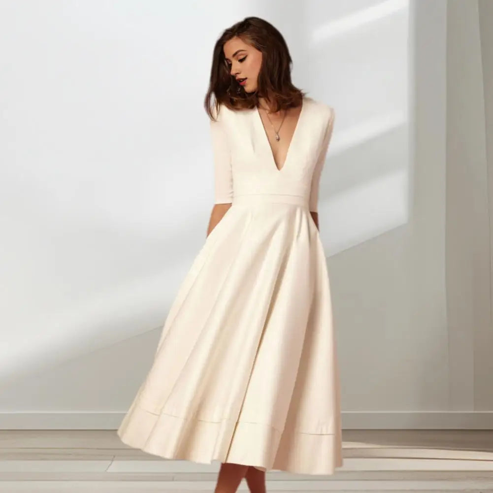 Nira | Feminin Midi-Kjole med Raffineret Elegance