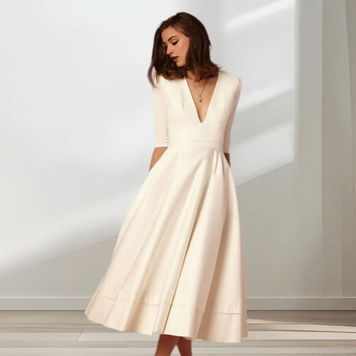 Nira | Feminin Midi-Kjole med Raffineret Elegance