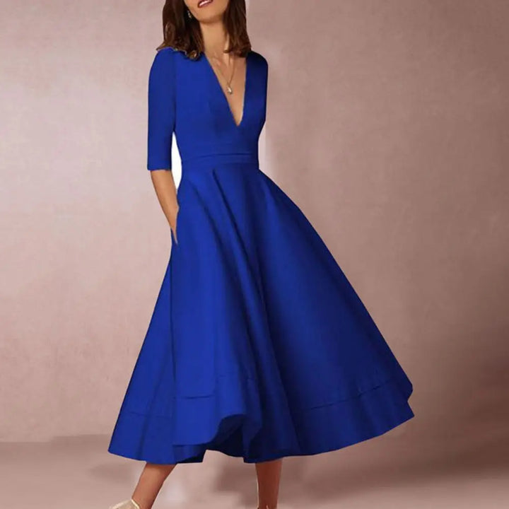 Nira | Feminin Midi-Kjole med Raffineret Elegance