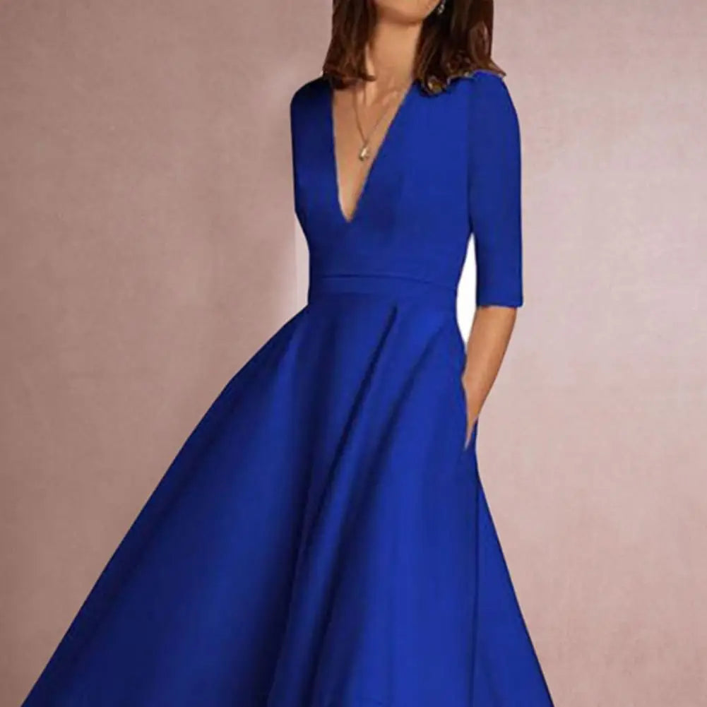 Nira | Feminin Midi-Kjole med Raffineret Elegance