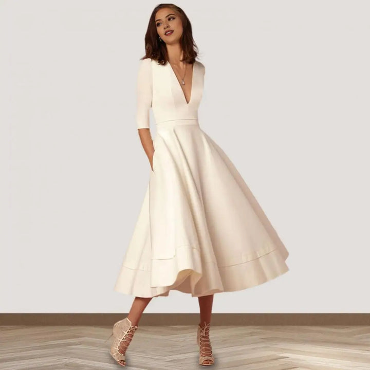Nira | Feminin Midi-Kjole med Raffineret Elegance
